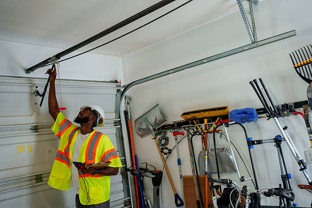 Professional Garage Door Panel Replacement technician working in Ely, MN
